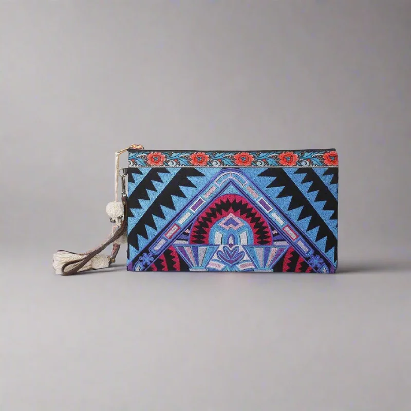 Botanica Embroidered Wristlet with PomPoms - Thailand Premium Handbags At Exclusive Prices Botanica Embroidered Wristlet with PomPoms - Thailand Premium Handbags At Exclusive Prices