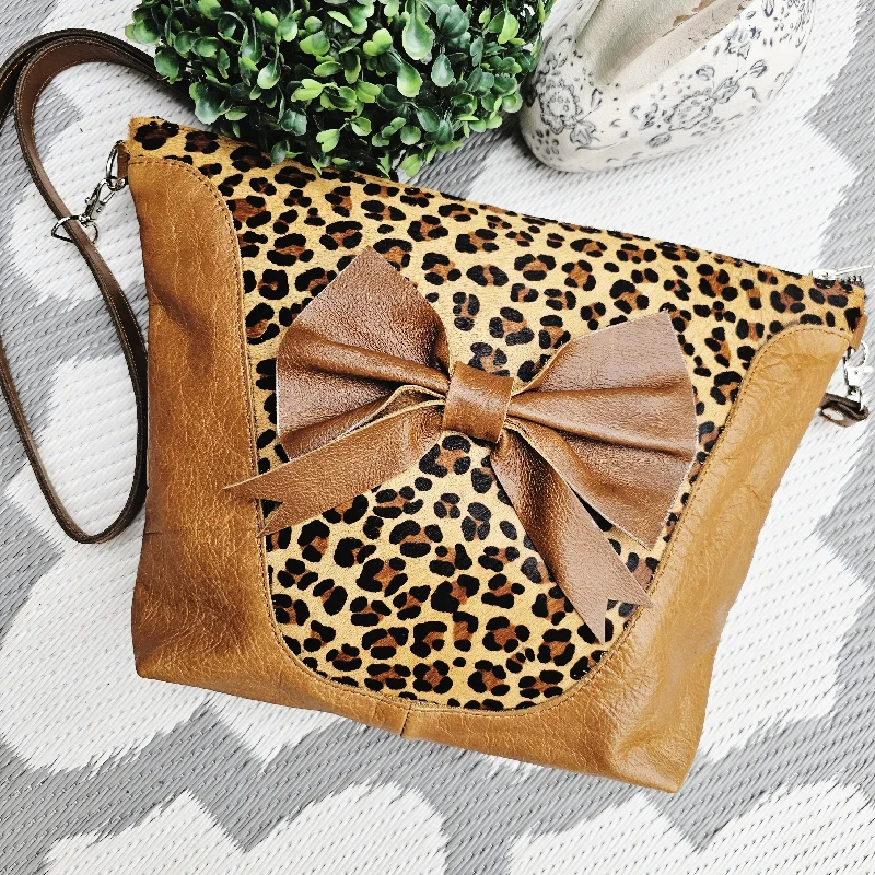 The Fabulous Genuine Leather Bow Leopard Crossbody Bag in Tan Trendy Handbags At Limited-Time Discounts The Fabulous Genuine Leather Bow Leopard Crossbody Bag in Tan Trendy Handbags At Limited-Time Discounts