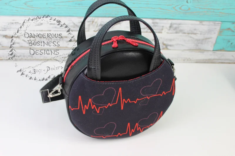 Heart Beat Circle Handbag Trendy Purses At Exclusive Promotional Rates